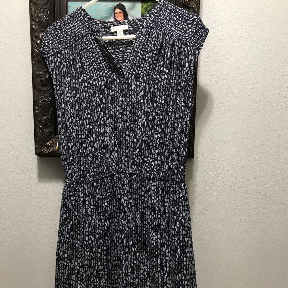 Blue and white dress. Soft material with pockets.